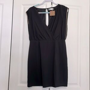 Black boutique dress with gold chain detail size lg